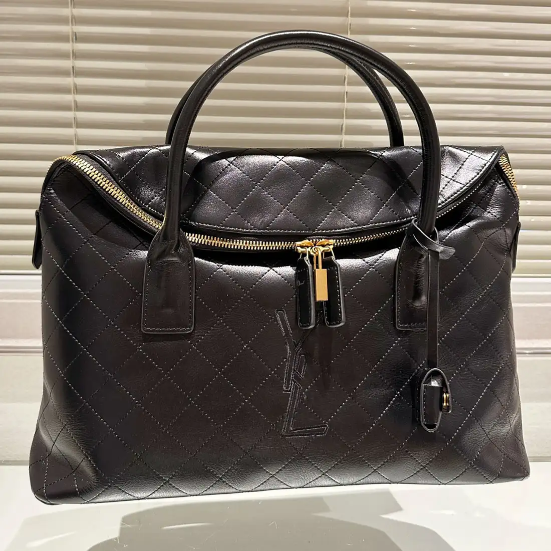 Star style quilted leather travel bag